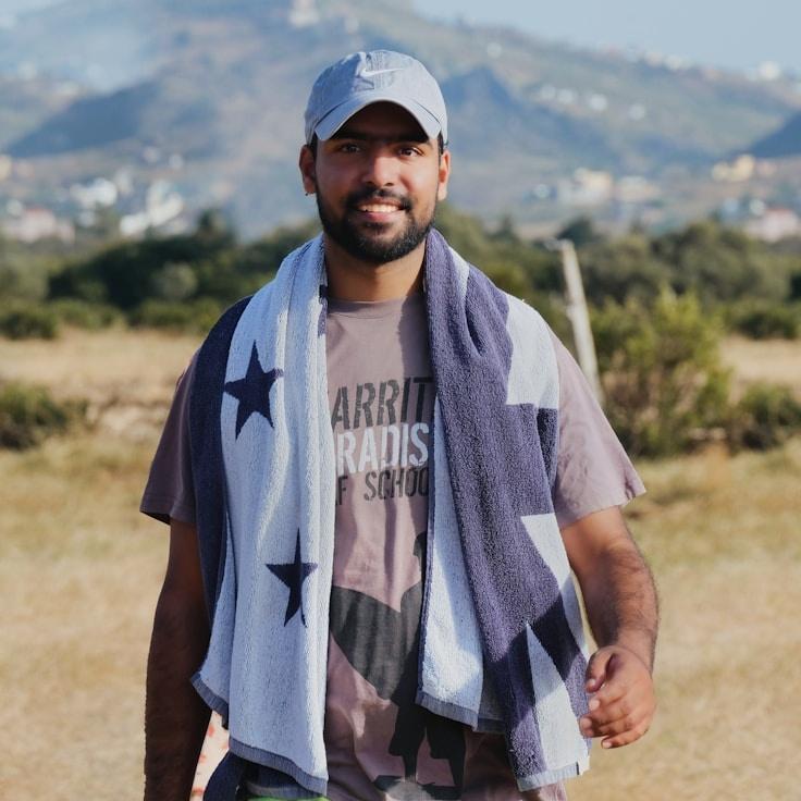 Aanya Singh, Lead Design Curator at Cipher Garden Field, reviewing corporate floral arrangements